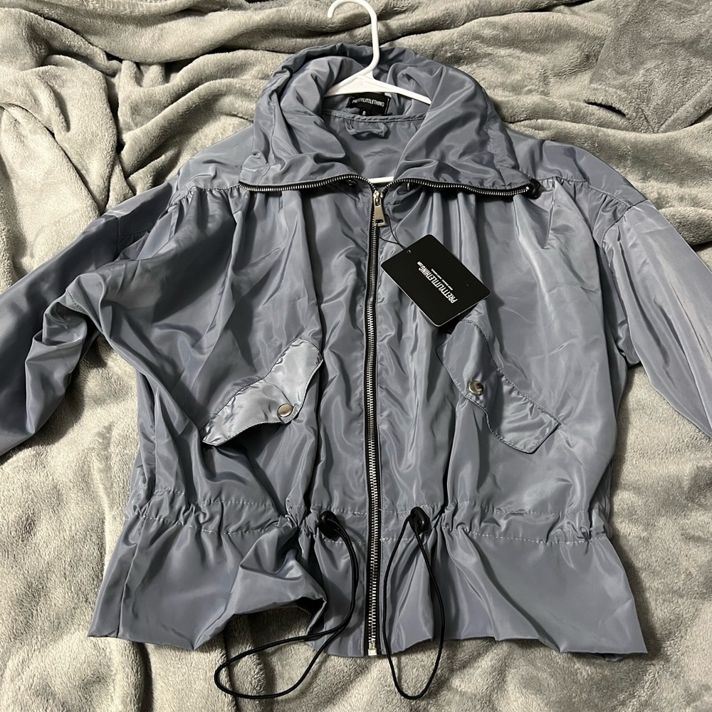 Gray windbreaker